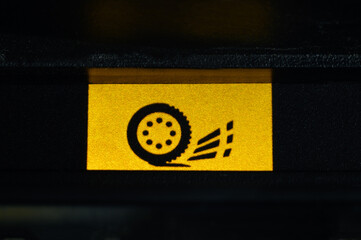 Wheel slip indicator on car dashboard, skidding of car, or one of wheels of front or rear axle of...