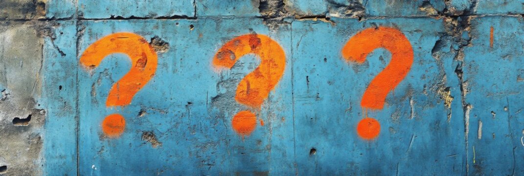 Three Orange Question Marks on a Weathered Blue Wall