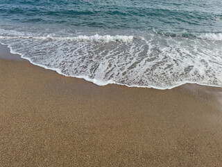 sea waves and sandy beach