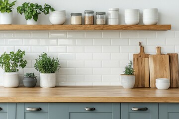 A nice tidy kitchen with a wooden kitchen counter and white walls