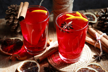 Mulled wine with fresh orange sliced. Traditional hot drink in Christmas time.