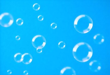 Bubbles floating in a blue sky with the sun shining through them bubbles in water