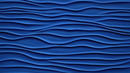 Abstract blue waves texture with smooth, flowing lines.