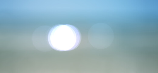Blur background circles bokeh beach and sea and with glowing