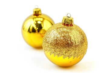 Two shiny Christmas ornaments on a white surface