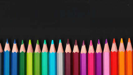 pencils on black background