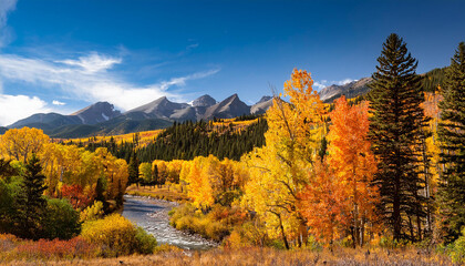 yellow, red and green aspens with colourful mountains
