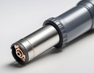 A close-up of a soldering heat shrink gun with no markings on a clean white surface. Generative AI
