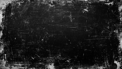 Black grunge scratched background with old film effect and dusty scary texture; space for text or design. Dark and scratched black grunge background, scratched black texture vintage film style.