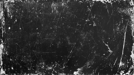 Obraz premium Black grunge scratched background with old film effect and dusty scary texture; space for text or design. Dark and scratched black grunge background, scratched black texture vintage film style.
