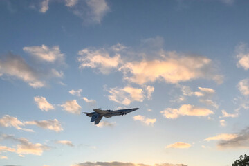 photographs of fighter jets, airplanes with power and elegance in the blue sky with white clouds