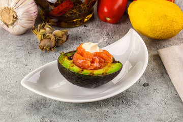 Whole grilled avocado with salmon