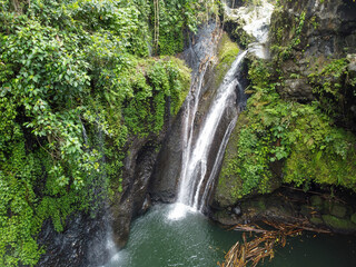 The drone view of Tebela Waterfall in Banyumas Regency, Central Java, Indonesia. It was taken on November 18, 2024 by a professional. It's a wonderful waterfall with a nice view