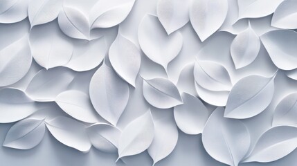 White paper leaves arranged artistically on a surface.