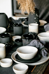 Rustic table setting with empty craft handmade ceramic tableware