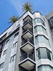 Obraz premium Detailed view of windows, doors and balconies of city buildings 