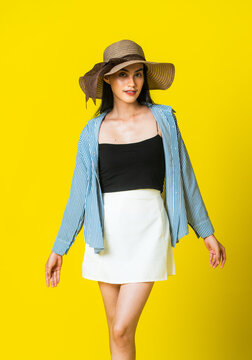 Western Female Model in Black Tank Top and White Skirt for Fashion Design