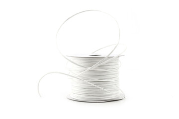 White paper covered craft wire isolated on white background. Abstract line of paper string with...