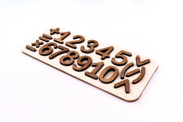 educational wooden number puzzle for kids on white background