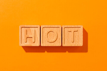 Hot wooden word concept in summer show higher Weather, concept global warming