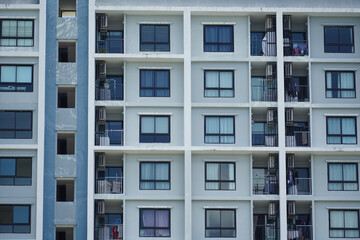 Detailed view of windows, doors and balconies of city buildings 