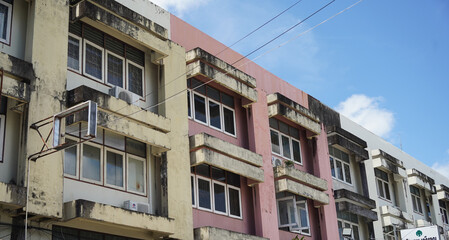 Detailed view of windows, doors and balconies of city buildings 
