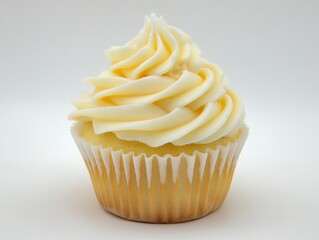 Vanilla cupcake with creamy frosting close-up.