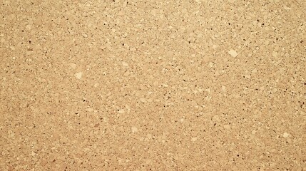Close-up of a textured brown cork board.