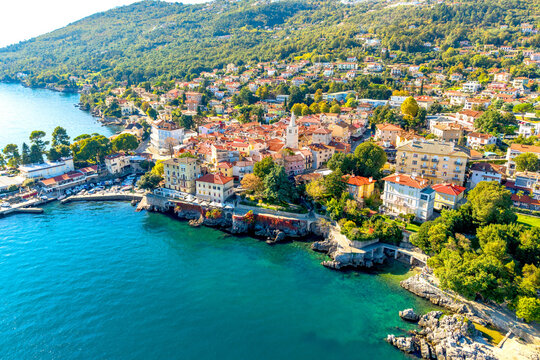 Seaside view of old town Lovran in the northeast of the Istrian peninsula. Opatijska rivjera. Kvarner bay. Travel in Croatia - Powered by Adobe