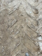 natural background of car trace on wet sand
