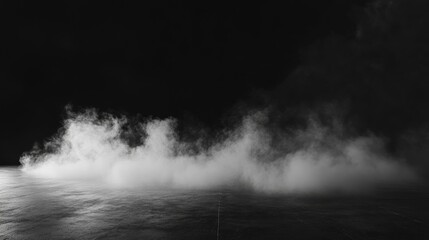 White smoke or fog rolling across the floor Dense mist fills a dark space with a black backdrop Smoke effects on a stage setting