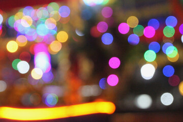 Colorful Defocused Bokeh Lights with Blur and Grain Texture in Night Scene