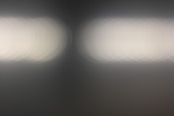 A dreamy view of a streak of white light.