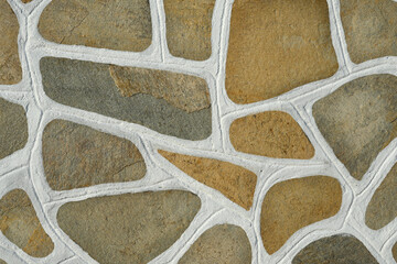 The surface of the stone floor with white seams Traditional cobblestone white painted pattern...