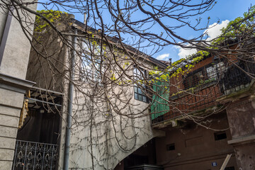Building with a green door and a window