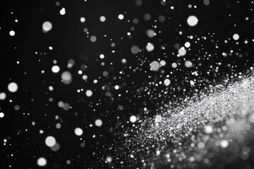 Obraz premium Snowflakes falling on black background for design or collage.