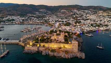Drone aerial view of Bodrum castle at sunset. © Roger