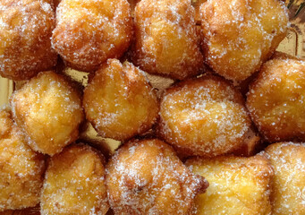 Delicious castagnole sprinkled with granulated sugar, close up
