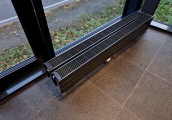 the heating element under the windows is gray and the double wiring will be done by a plumber. setting and allowing water is necessary before the season