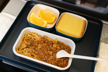 Noodles with mixed sauce on the plane