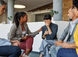 psychotherapy meeting woman support therapy psychology patient sad cry hug crying businesswoman tear  friend depression group emotion pain psychologist communication help