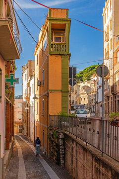 View of the narrow alleyways and slim houses of the old romantic mountain village of Baunei. Ogliastra, Sardinia, Italy.
