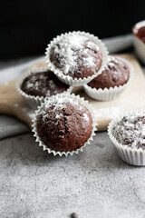 
chocolate cupcakes with chocolate chips.on a gray table.dessert
