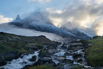 View of Ulamertorsuaq mountain and the view of surrounding mountains and glaciers in Tasermiut fjord (South Greenland)