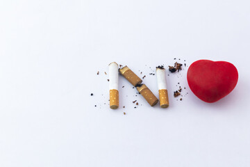 Heart with smoked cigarette and copy-space.