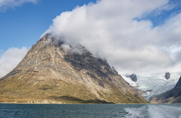 View of Ulamertorsuaq mountain and the view of surrounding mountains and glaciers in Tasermiut fjord (South Greenland)	