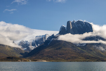 View of Ulamertorsuaq mountain and the view of surrounding mountains and glaciers in Tasermiut...