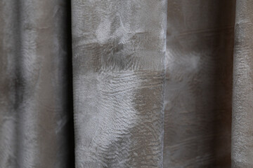 Closeup of grey velour curtain textured  background