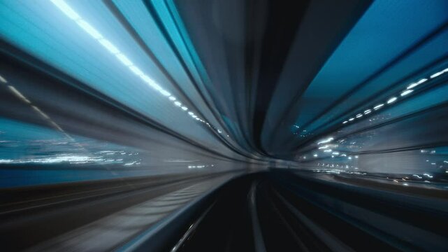 Vehicle traveling through tunnel with motion blur