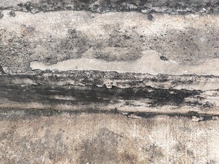 Rough gray concrete wall background with aged textured surface